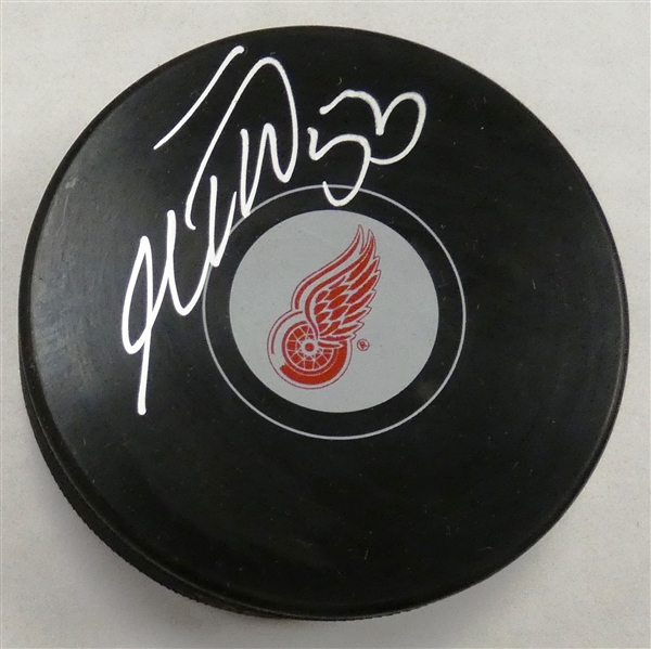 Moritz Seider Autographed Red Wings Puck