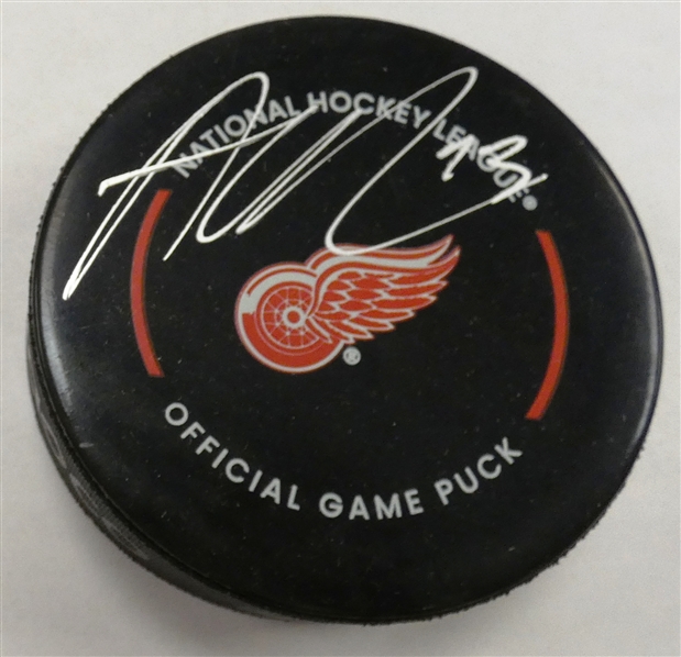 Alex DeBrincat Autographed Red Wings Puck