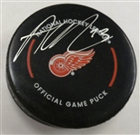 Alex DeBrincat Autographed Red Wings Puck