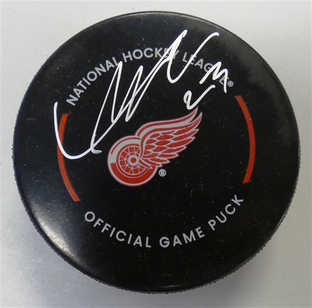 Lucas Raymond Autographed Red Wings Puck