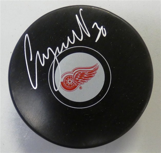 Chris Osgood Autographed Red Wings Puck
