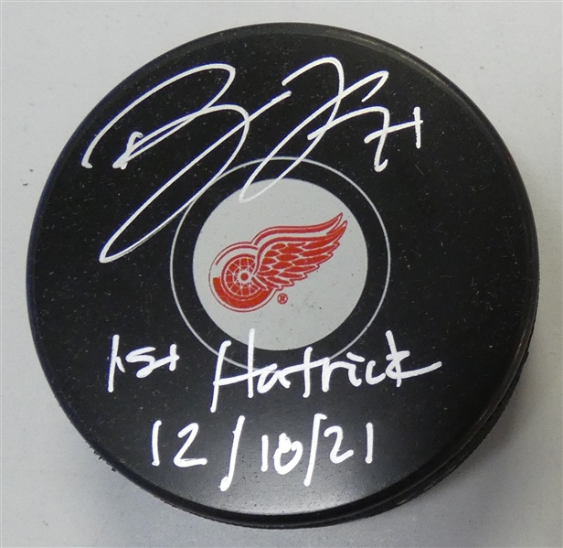 Dylan Larkin Autographed Red Wings Puck w/ 1st Hatrick