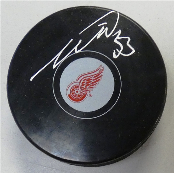 Moritz Seider Autographed Red Wings Puck