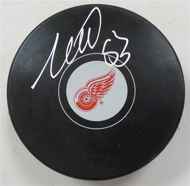 Moritz Seider Autographed Red Wings Puck