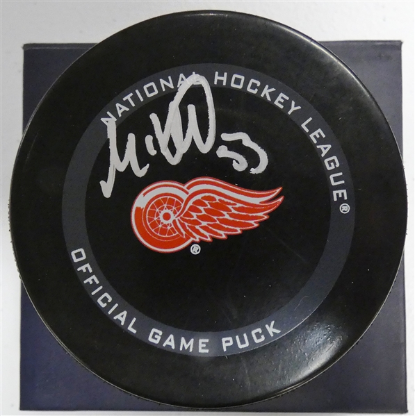 Moritz Seider Autographed Red Wings Puck