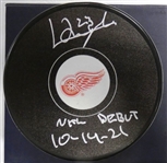 Lucas Raymond Autographed Red Wings Puck w/ NHL Debut