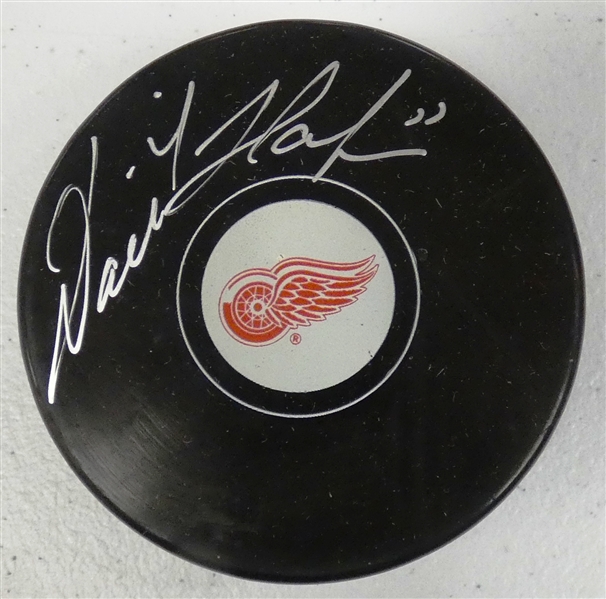 Dominik Hasek Autographed Red Wings Puck