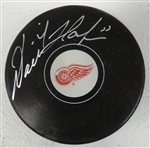 Dominik Hasek Autographed Red Wings Puck