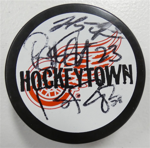 Brad Stuart, Dominik Hasek & Brian Rafalski Autographed Hockeytown Puck
