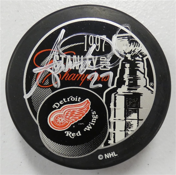 Aaron Ward Autographed 1997 Cup Puck