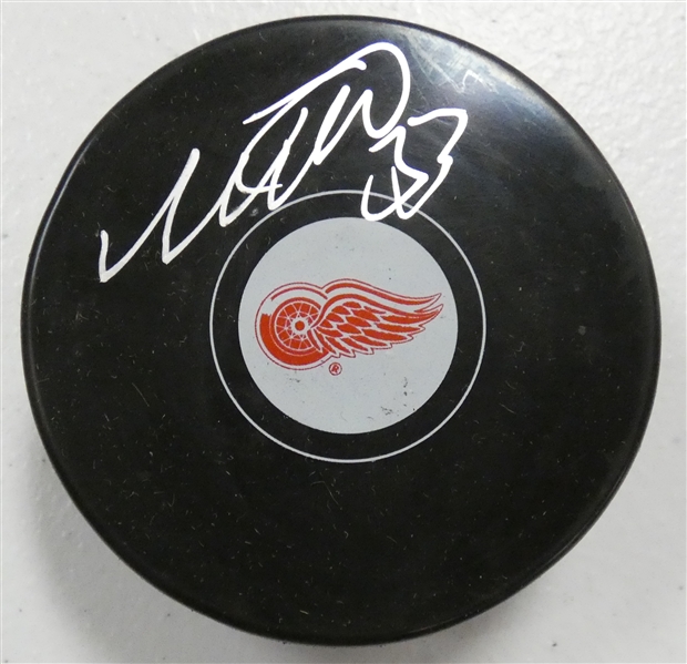 Moritz Seider Autographed Red Wings Puck