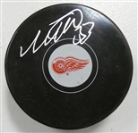 Moritz Seider Autographed Red Wings Puck