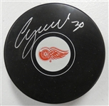 Chris Osgood Autographed Red Wings Puck