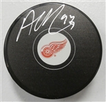 Alex DeBrincat Autographed Red Wings Puck