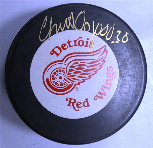 Chris Osgood Autographed Red Wings Puck