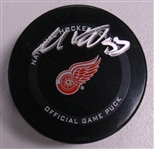 Moritz Seider Autographed Red Wings Puck