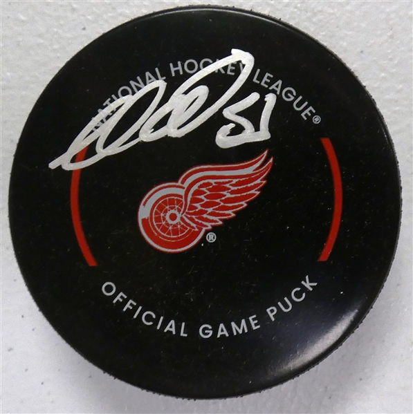 Moritz Seider Autographed Red Wings Puck