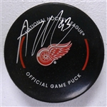 Alex DeBrincat Autographed Red Wings Puck