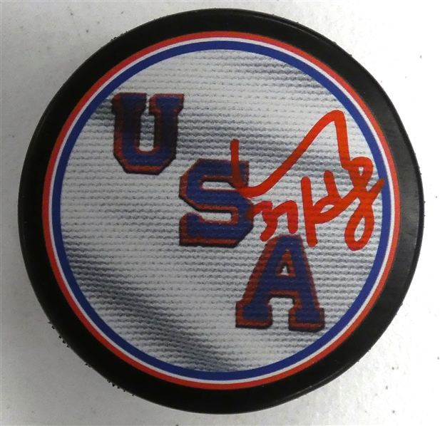 Connor Hellebuyck Autographed USA Puck