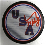 Connor Hellebuyck Autographed USA Puck