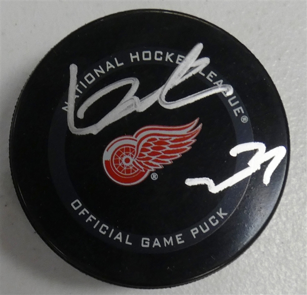 Lucas Raymond Autographed Red Wings Puck