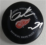 Lucas Raymond Autographed Red Wings Puck