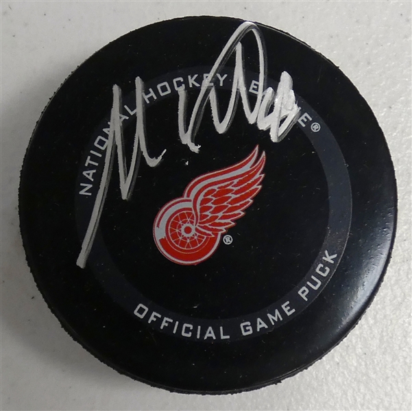 Moritz Seider Autographed Red Wings Puck