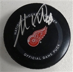 Moritz Seider Autographed Red Wings Puck