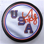 Connor Hellebuyck Autographed USA Puck