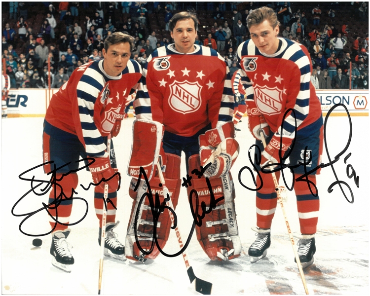 Yzerman, Cheveldae & Fedorov Autographed 8x10